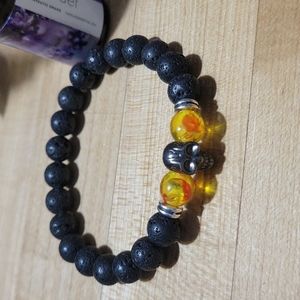 Essential Oil Diffuser Lava stone bracelet with yellow chakra beads & skull.